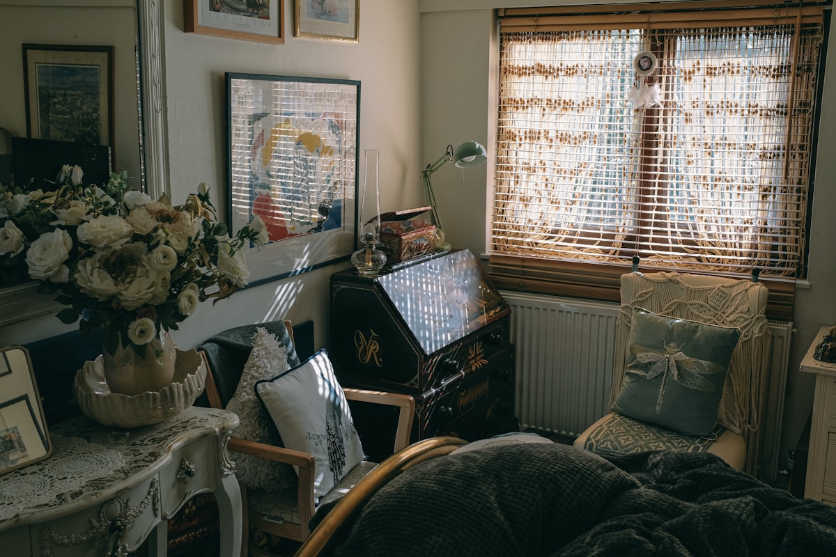 moody candlelit cottage room with botanical accents